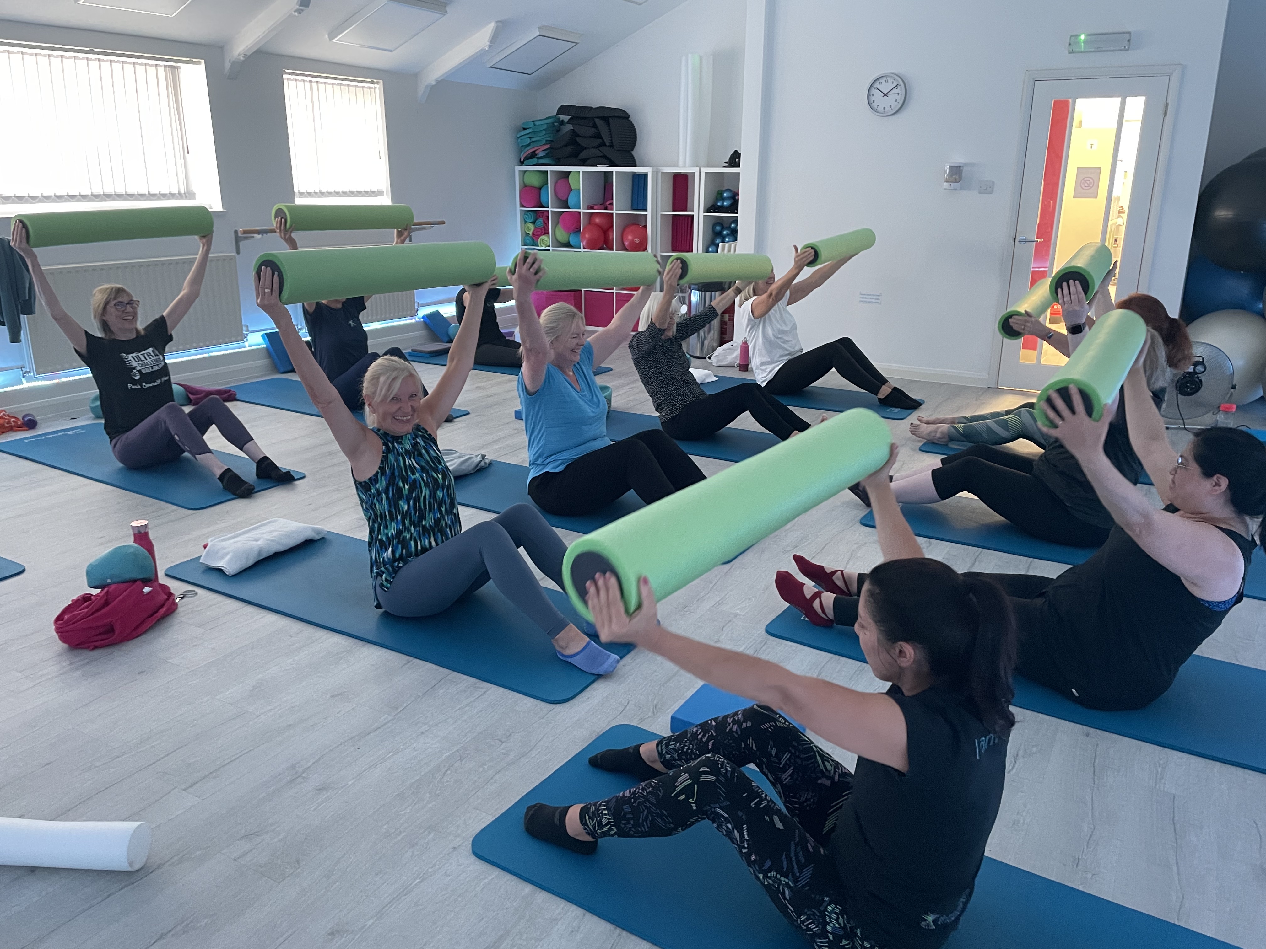 Members enjoying a small group Pilates class in Baldock