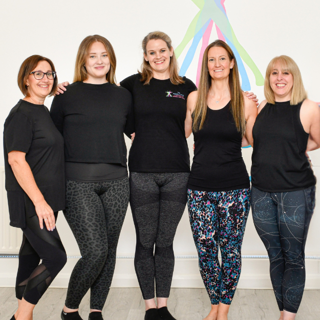 The Pilates Corner instructor team in the studio